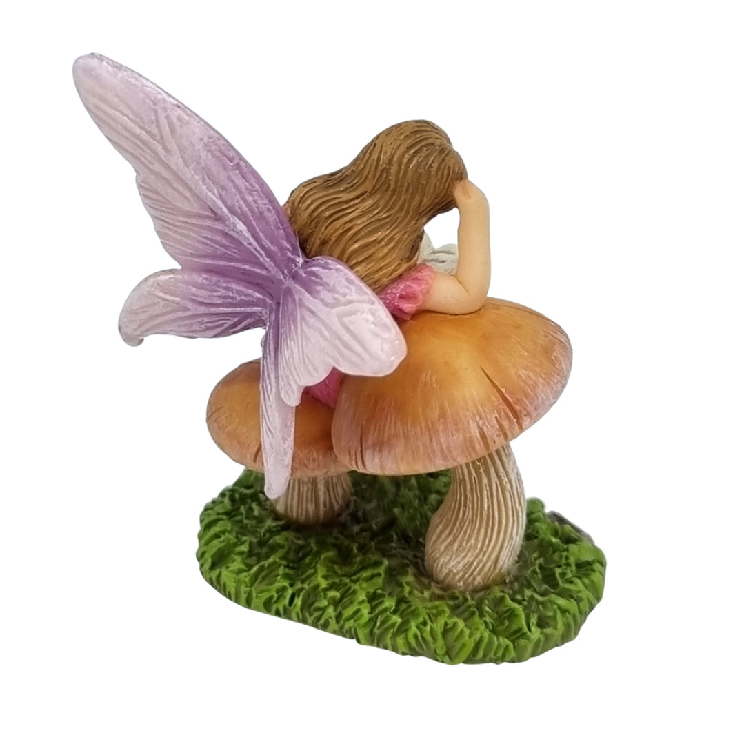 Storytime Fairy Sitting on a Mushroom