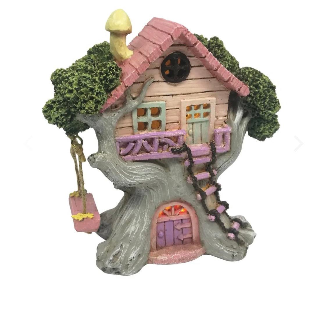Pretty Tree House with Swing